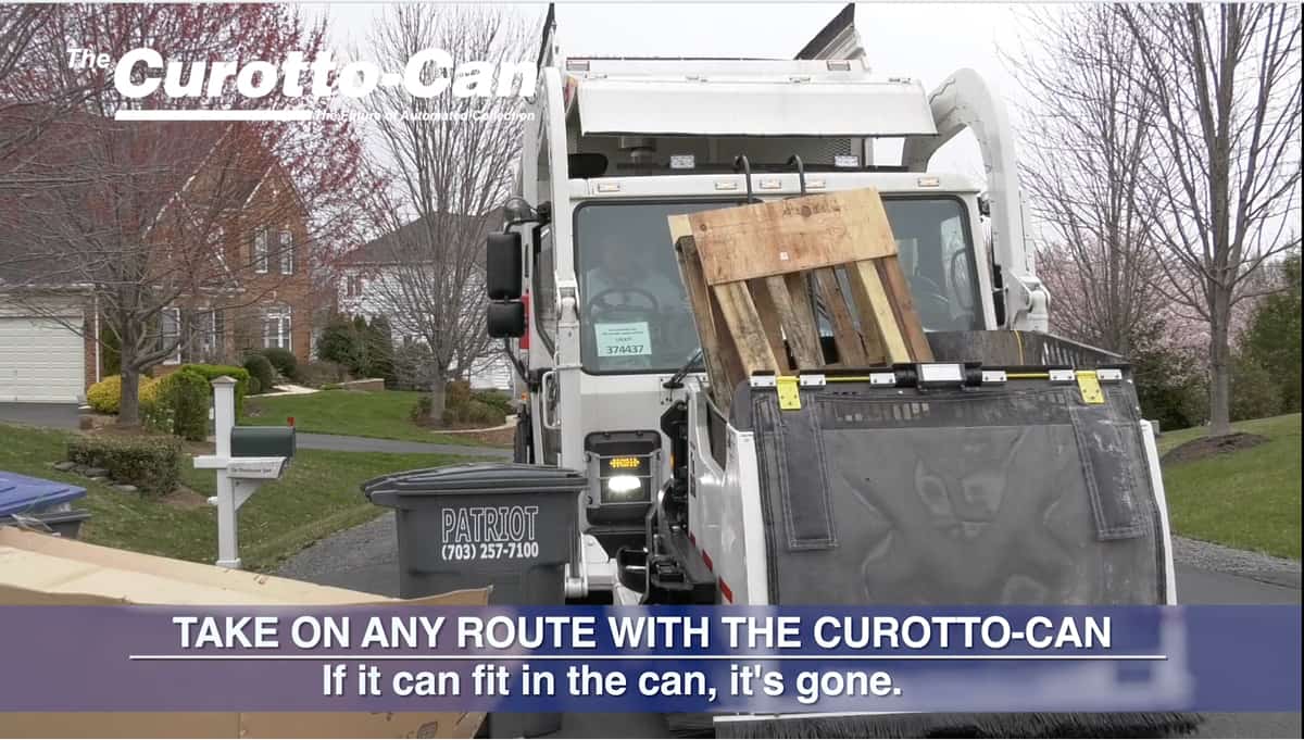 Automated Garbage Truck Picking Up Bulk Items
